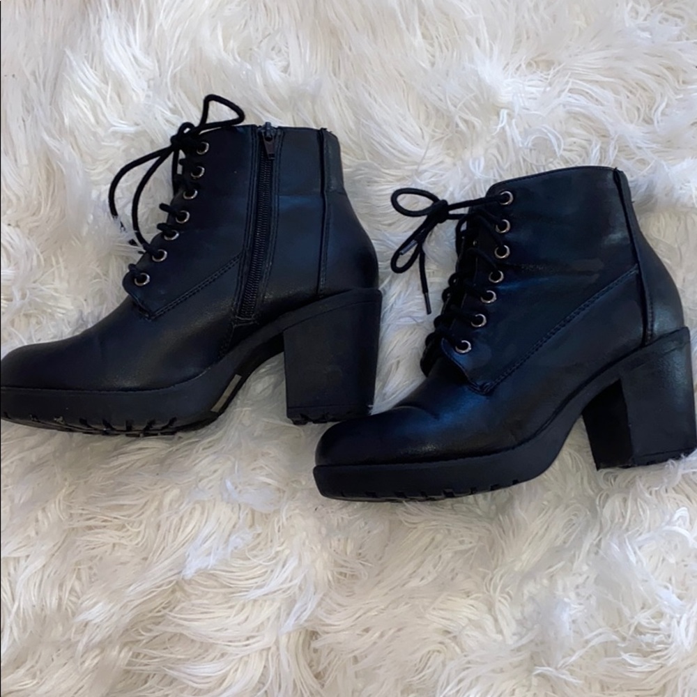 Black combat boots with heel